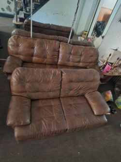 Leather couch and love seat.