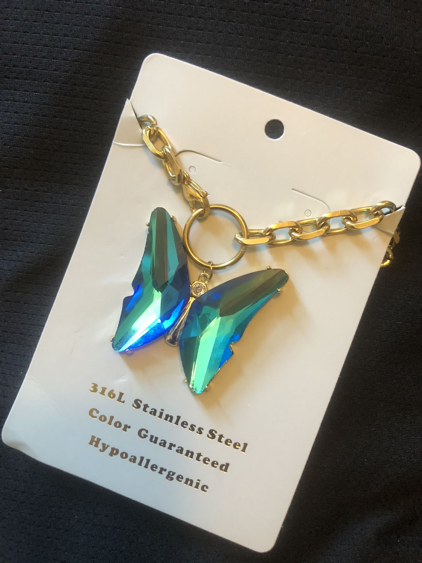 butterfly necklace in blue stainless steel