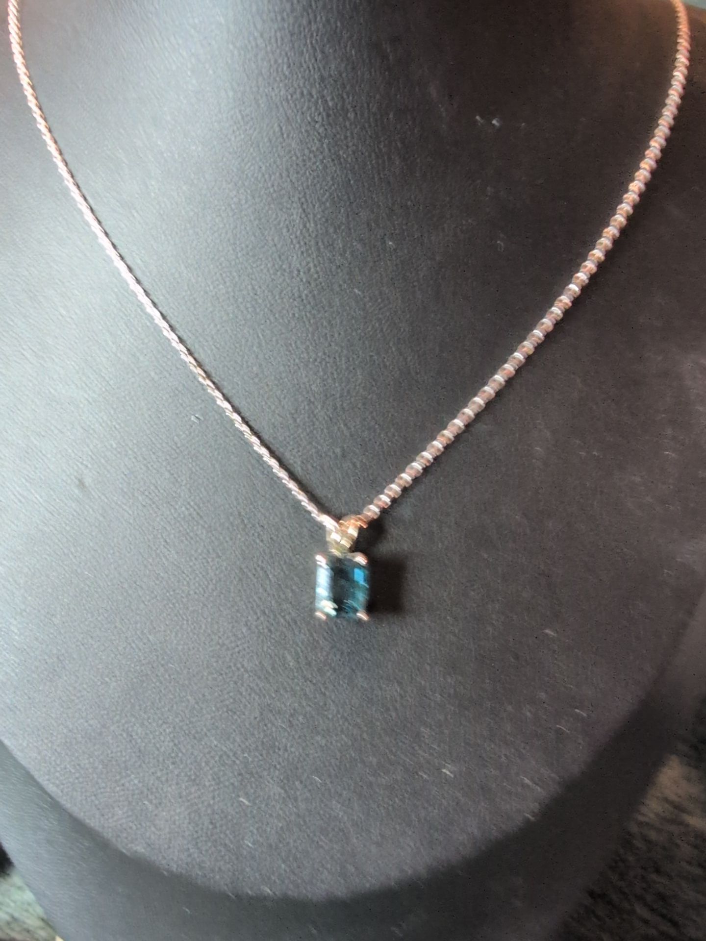 blue topaz pendant necklace and earrings