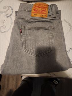 2 pairs of Grey Levi's size 36m