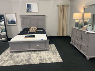Brand new floor model queen size bed frame