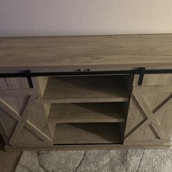Entertainment Center 65”  Barely Used Perfect Condition