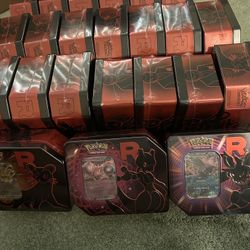 Team Rocket Tins
