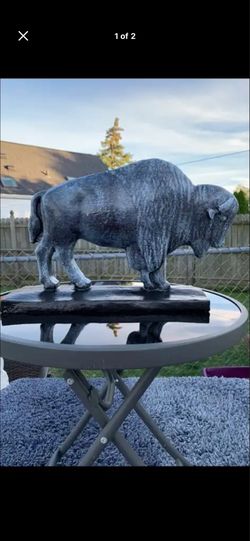 The old gray buffalo statue