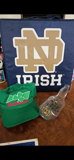 Notre Dame, Fighting Irish seat cushion & unique are-work inside a glass bottle that is bent, firm.