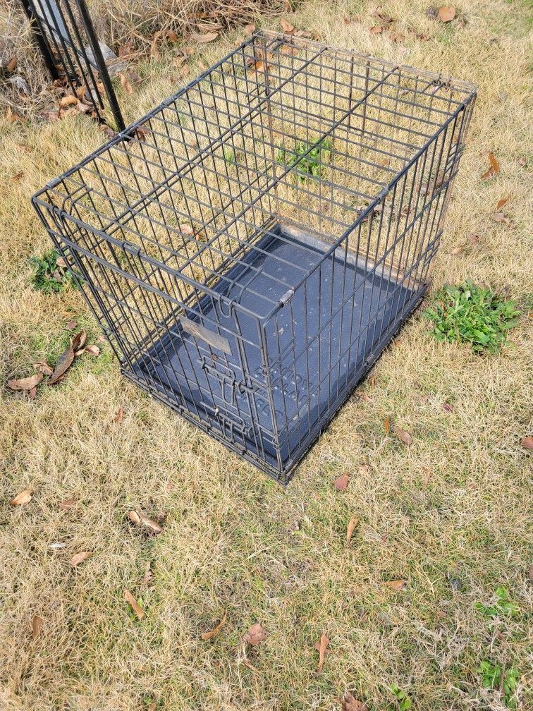 SMALL  DOG  CAGE.   25.00 NO LESS