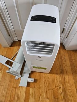 Portable Air Conditioner (A/C) 12000 btu.  All accessories vent, hose remote control included.