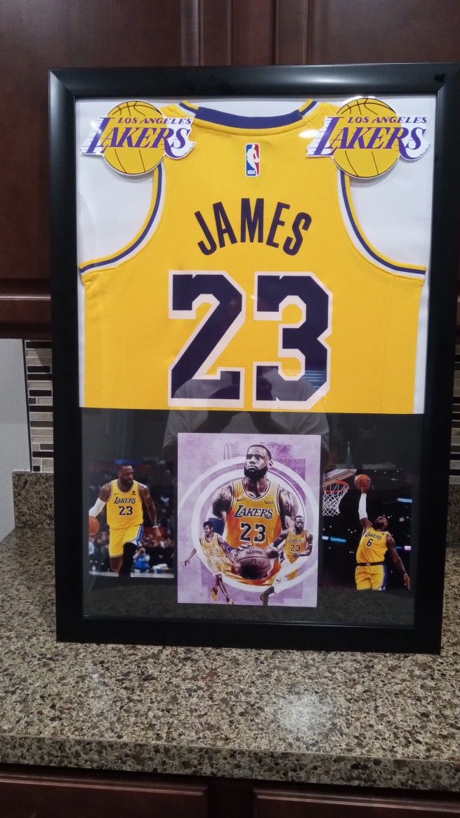 LEBRON JAMES OF THE LA LAKERS CUSTOM BRANDED AUTHENTIC FRAMED JERSEY.