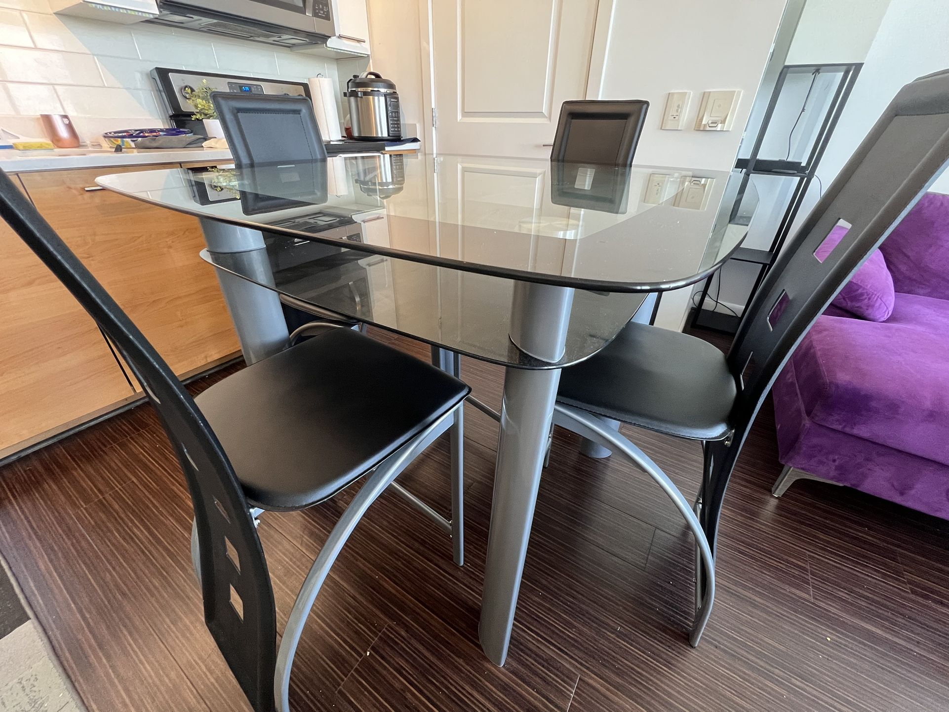 Mccready Glass Top Metal Base Dining Table