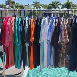 Rack of casual shirts (some new with price label)