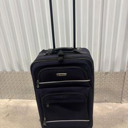 Skyline Carry on luggage on wheels. 23 “ high 7” depth.. $30
