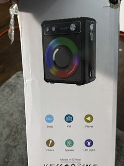 Portable karaoke speaker with 2 wireless mics and shoulder strap and charger