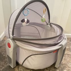 Fisher Price Portable Bassinet On-The-Go Baby Dome Travel Play Space with Toys & Canopy