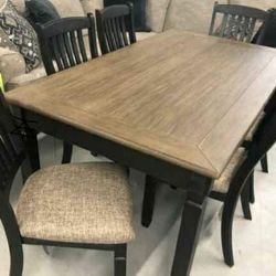 Tyler Creek Black/Grayish Brown Dining Table And 6 Chairs
