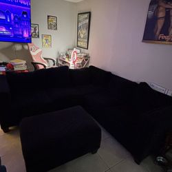 Beautiful black sofa with ottoman