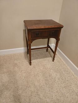 Vintage sewing machine cabinet/ side table