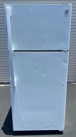 Ge top freezer refrigerator