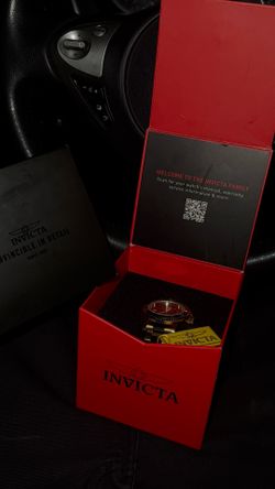 Green face Invicta brand watch