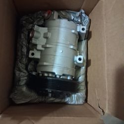 NEW A/C COMPRESER AND ALTINATOR