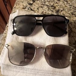 Two Pairs Of Sunglasses