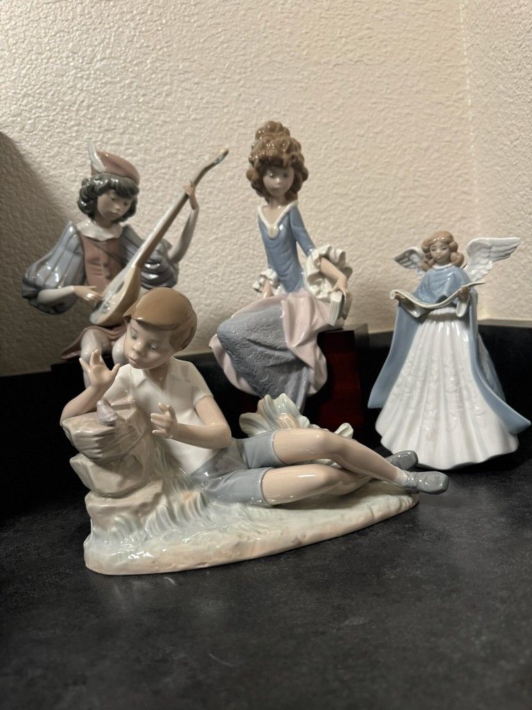 Lladro figurine collection LOT of 4