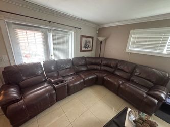 Brown leather sectional couch