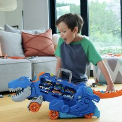 Hot Wheels City Ultimate T-Rex Transporter, Hauler Transforms into a Dino, Featured in “Let’s Race”