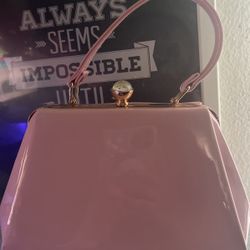 Pink glossy purse