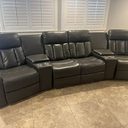 New Power Reclining Sectional .  Grey Gel Leatherette .  138” X 38”.  Free Delivery !