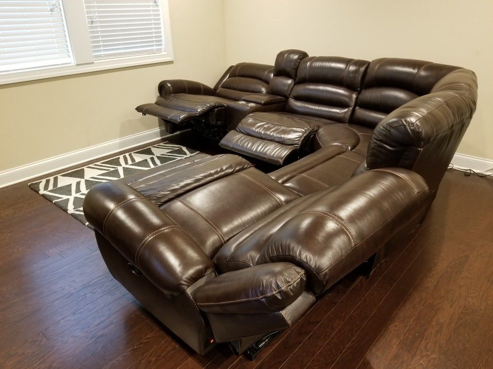 Sectional leather sofa - 2 powered and 1 manual recliner