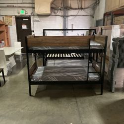 Twin bunk bed. Comes in espresso. Assembly required. Assembly not included. Taxes included. Free delivery.  Bunk bed only-$220 Bunk bed with mattresse
