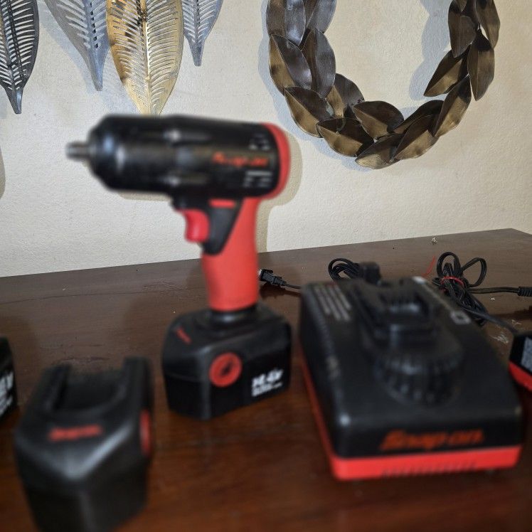 1/4" Size  Impact Wrench With Charger  &  2 Batterys