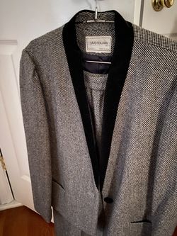 Woman’s Suit— Size 9. $40
