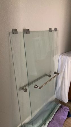 Shower doors for tub enclosure