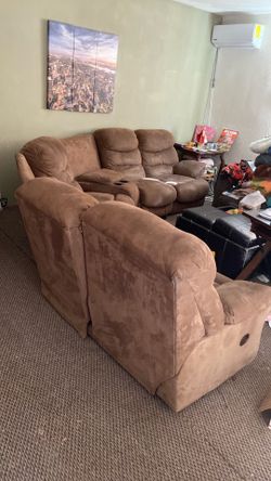 Couch: 3 recliners within