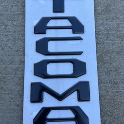 OE Tacoma Black Tailgate Insert Emblems