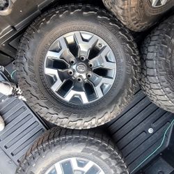 Toyota Tacoma 16 inch rims.  Great shape.  Not much left on tires, comes with new set of lugnuts