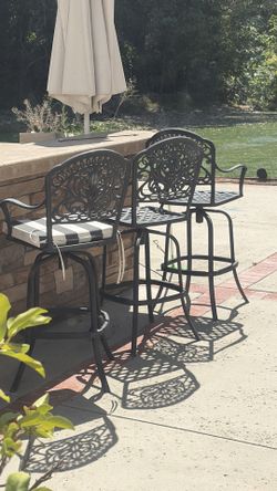 Set of four bar stools iron