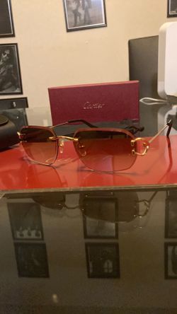 Cartier gold rimless sunglasses