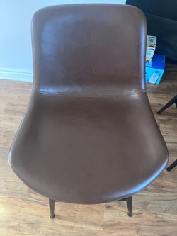 4  brown counter barstools