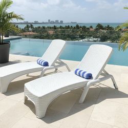 set of reclining outdoor chaise lounge chairs