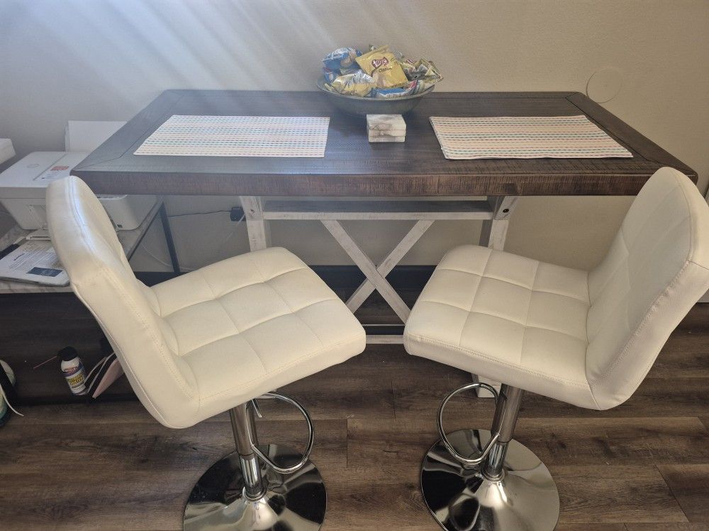Dinning Table Counter Height Bar Table And (2) Two Stools.