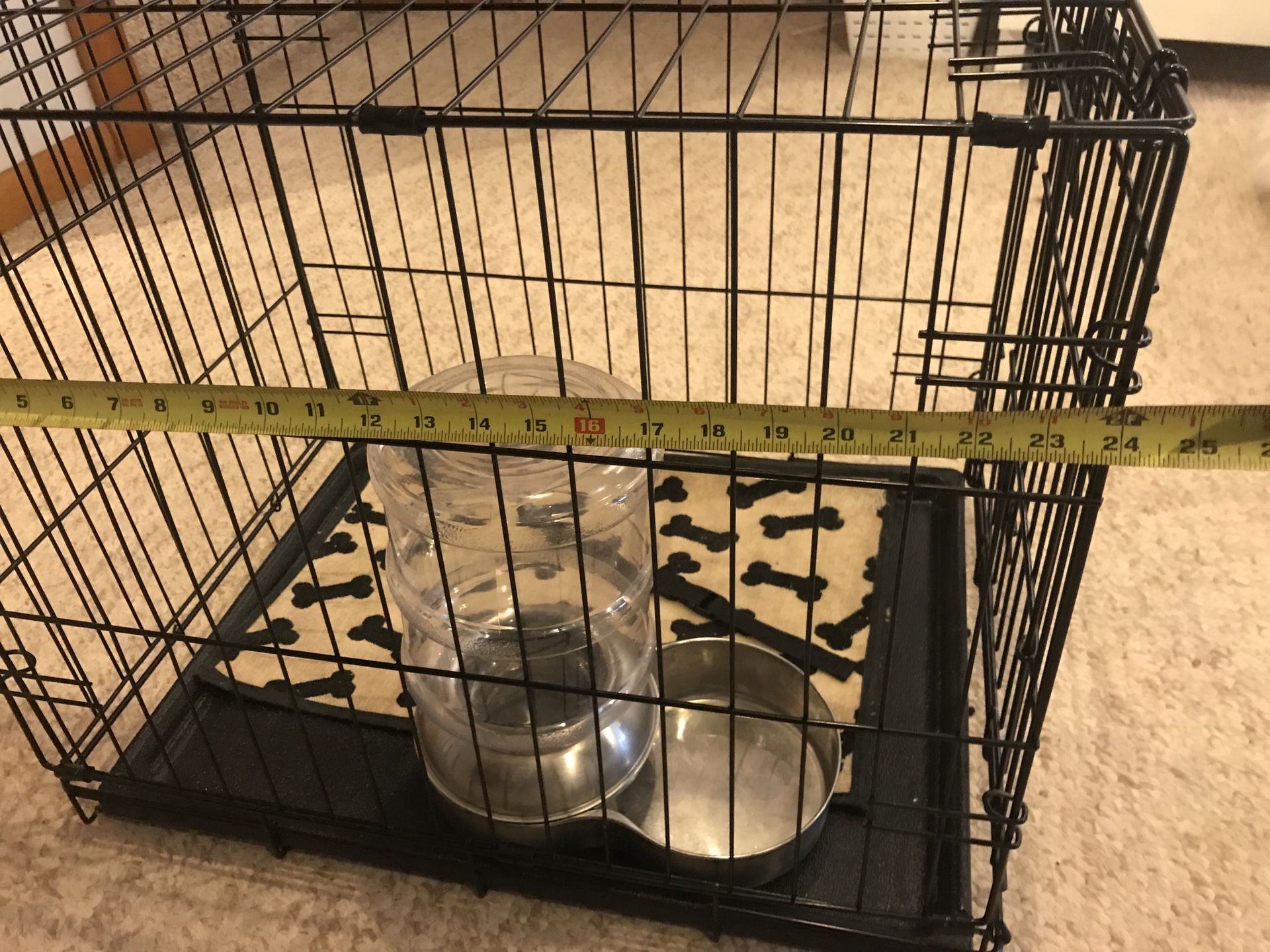 Medium dog cage and water dispenser