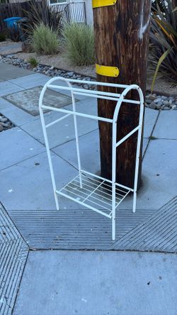 Small clothes hanging rack