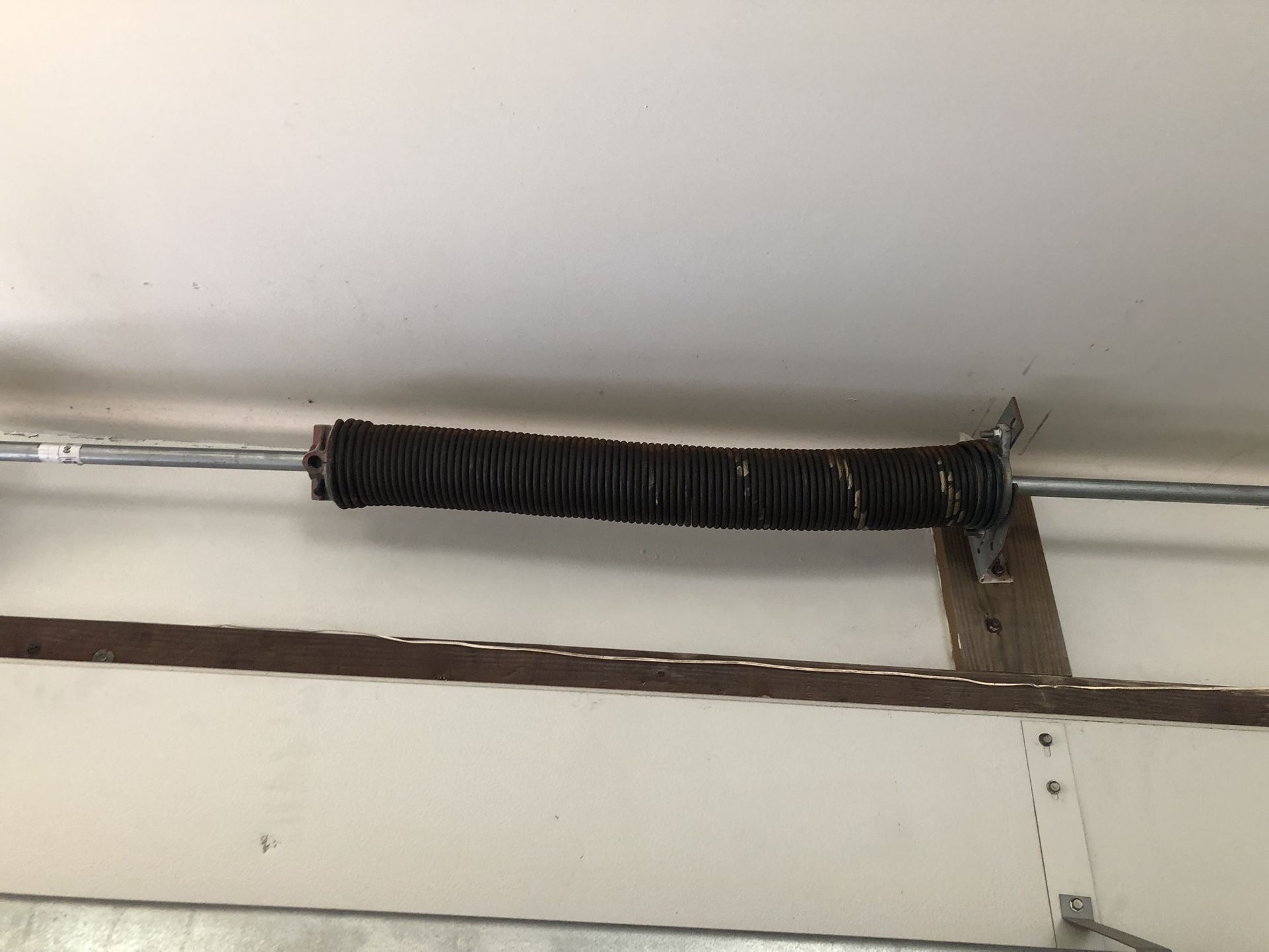 Garage Door Spring Adjustment And Replace