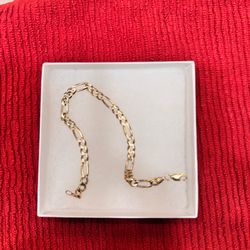 14k gold Figaro bracelet