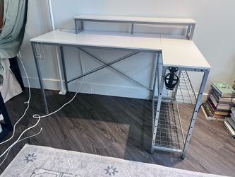 Modern white desk with outlet