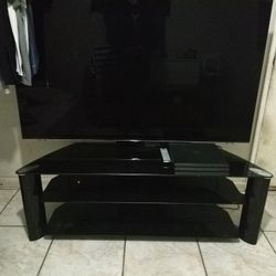 65" Smart TV And Stand 