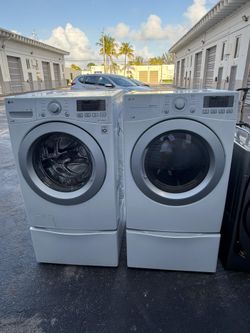 “LG Silver Washer & Dryer Set – Modern, Powerful & Reliable”