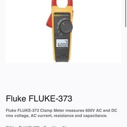 Fluke FLUKE-373 Clamp Meter measures 600V AC and DC rms voltage, AC current, resistance and capacitance.
